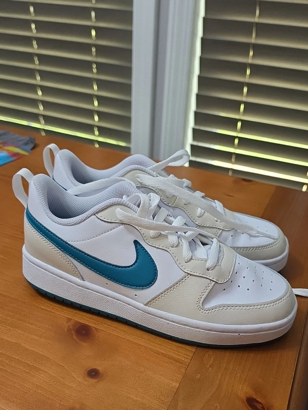 Nike Kids White Sneakers with Teal Swoosh